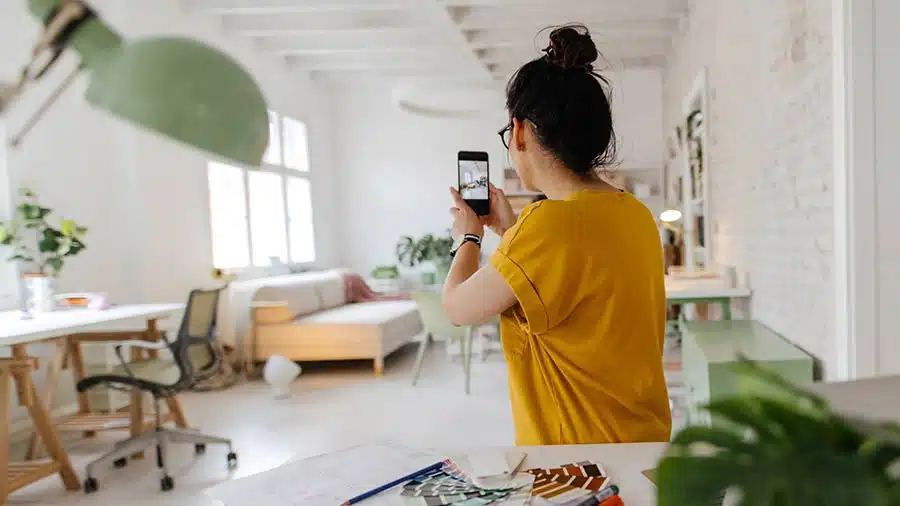 Image of interior designer taking a picture